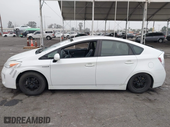 2012 Toyota Prius One with VIN JTDKN3DU2C5405826, listed as a IAAI auction lot 41180082 with 152,086 mi miles and . Bid and sale history available at DreamBid. Image 14.