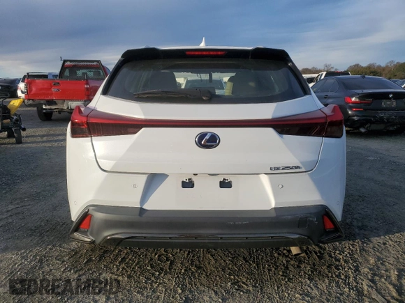 2022 Lexus UX 250h F Sport with VIN JTHE9JBHXN2057983, listed as a Copart auction lot 46143515 with 27,367 mi miles and Salvage Title. Bid and sale history available at DreamBid. Image 6.