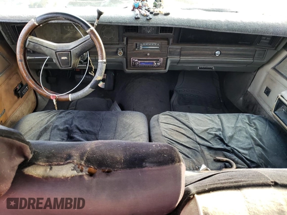 1979 Chevrolet Caprice z VIN 1N69G9C181400, wystawiony jako Copart lot #87016834 z przebiegiem 38 392 mil mil oraz Szkoda całkowita • Salvage title. Historia ofert i sprzedaży dostępna na DreamBid. Obrazek 8.