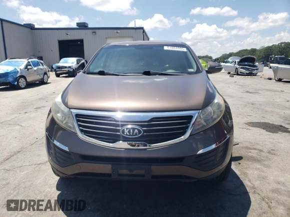 2012 Kia Sportage LX with VIN KNDPB3A20C7276250, listed as a Copart auction lot 61804995 with 112,303 mi miles and Salvage title. Bid and sale history available at DreamBid. Image 5.