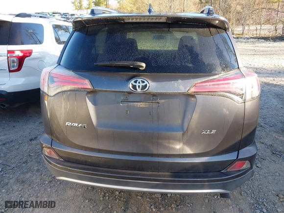 2016 Toyota RAV4 XLE with VIN 2T3WFREV0GW266691, listed as a IAAI auction lot 41804023 with 77,000 mi miles. Bid and sale history available at carsss.com. Image 16.