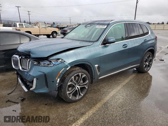 2025 BMW X5 sDrive40i with VIN 5UX13EU04S9W39305, listed as a Copart auction lot 43822695 with 0 mi miles and Salvage Title. Bid and sale history available at carsss.com. Image 1.