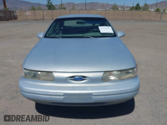 1994 Ford Taurus GL z VIN 1FALP52U2RG186625, wystawiony jako IAAI lot #42381964 z przebiegiem 54 020 mil mil oraz . Historia ofert i sprzedaży dostępna na DreamBid. Obrazek 6.