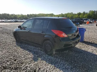 2009 Nissan Versa 1.8 SL with VIN 3N1BC13E59L500137, listed as a Copart auction lot 52339125 with 121,643 mi miles and Salvage Title. Bid and sale history available at carsss.com. Image 2.