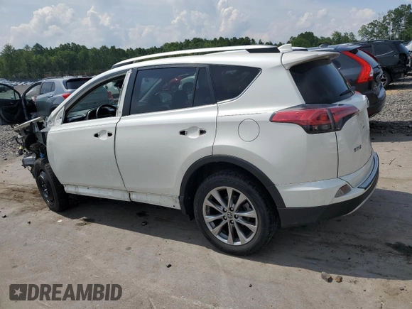 2016 Toyota RAV4 Limited with VIN JTMDJREV4GD026028, listed as a Copart auction lot 63848635 with 90,104 mi miles and Salvage title. Bid and sale history available at DreamBid. Image 2.