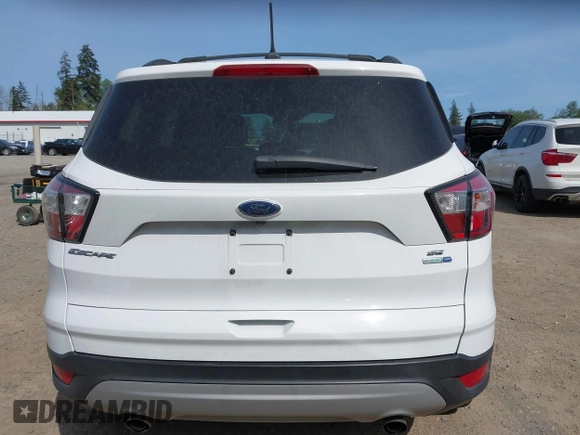 2018 Ford Escape SE with VIN 1FMCU9GD8JUB14879, listed as a IAAI auction lot 42156044 with 91,304 mi miles. Bid and sale history available at carsss.com. Image 17.