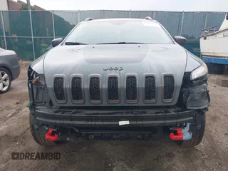 2014 Jeep Cherokee Trailhawk with VIN 1C4PJMBB5EW156315, listed as a IAAI auction lot 42426229 with 154,019 mi miles and . Bid and sale history available at DreamBid. Image 13.