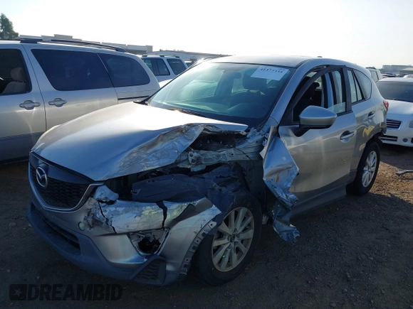2014 Mazda CX-5 Sport with VIN JM3KE2BE9E0330345, listed as a IAAI auction lot 41377335 with 103,340 mi miles and . Bid and sale history available at carsss.com. Image 6.