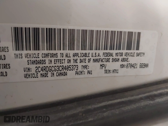2012 Dodge Grand Caravan SXT with VIN 2C4RDGCG3CR405373, listed as a IAAI auction lot 41264407 with 164,019 mi miles and . Bid and sale history available at DreamBid. Image 9.