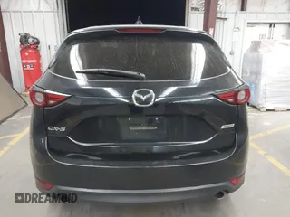 2018 Mazda CX-5 Grand Touring z VIN JM3KFADMXJ0311101, wystawiony jako IAAI lot #42163070 z przebiegiem 129 284 mil mil oraz . Historia ofert i sprzedaży dostępna na DreamBid. Obrazek 17.