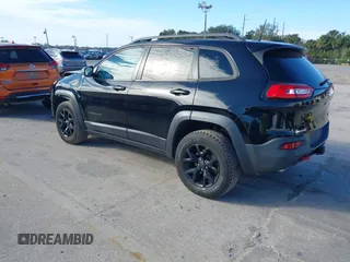 2018 Jeep Cherokee Trailhawk with VIN 1C4PJMBX3JD546332, listed as a IAAI auction lot 41269245 with 88,466 mi miles. Bid and sale history available at carsss.com. Image 3.