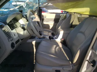 2009 Mercury Mariner Premier z VIN 4M2CU87789KJ23933, wystawiony jako Copart lot #45120455 z przebiegiem 104 465 mil mil oraz Szkody całkowita. Historia ofert i sprzedaży dostępna na DreamBid. Obrazek 7.