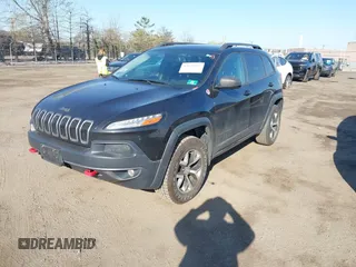 2014 Jeep Cherokee Trailhawk with VIN 1C4PJMBS5EW280598, listed as a IAAI auction lot 42079597 with 171,564 mi miles. Bid and sale history available at carsss.com. Image 17.