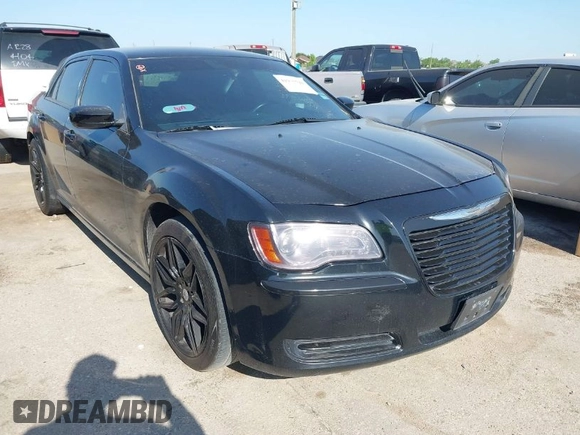 2013 Chrysler 300 with VIN 2C3CCAAGXDH660851, listed as a IAAI auction lot 41970721 with 112,017 mi miles and . Bid and sale history available at carsss.com. Image 1.