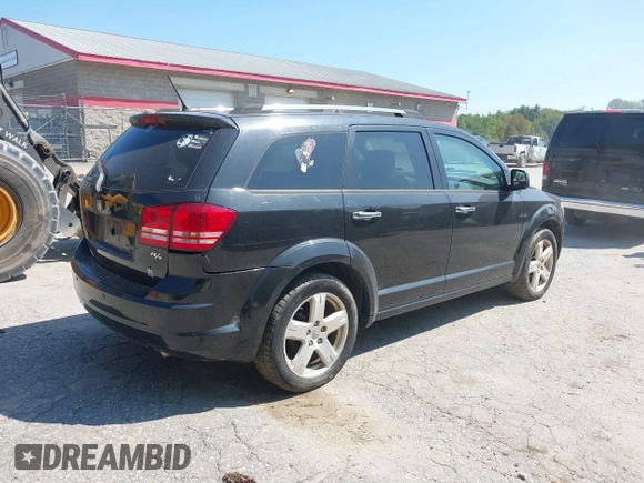 2009 Dodge Journey R/T with VIN 3D4GH67V99T139333, listed as a IAAI auction lot 40259433 with 189,762 mi miles. Bid and sale history available at carsss.com. Image 4.