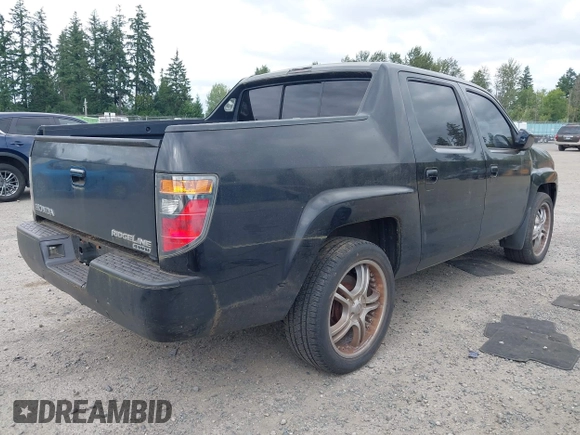 2006 Honda Ridgeline RTL with VIN 2HJYK16526H517466, listed as a IAAI auction lot 42737202 with 184,856 mi miles and . Bid and sale history available at DreamBid. Image 4.