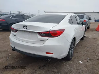 2014 Mazda Mazda6 i Touring with VIN JM1GJ1V6XE1159155, listed as a IAAI auction lot 41885397 with 162,045 mi miles. Bid and sale history available at carsss.com. Image 4.