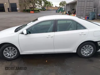 2012 Toyota Camry L with VIN 4T4BF1FK0CR269815, listed as a IAAI auction lot 40612519 with 143,088 mi miles. Bid and sale history available at carsss.com. Image 14.