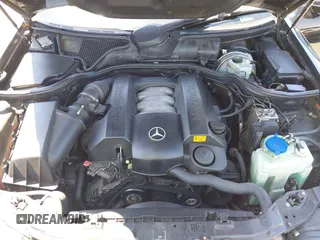 2002 Mercedes-Benz E-Class with VIN WDBJF65J62B404868, listed as a IAAI auction lot 42121837 with 107,415 mi miles. Bid and sale history available at carsss.com. Image 10.