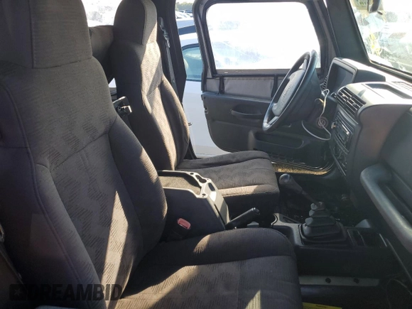 2003 Jeep Wrangler X with VIN 1J4FA39S73P340698, listed as a Copart auction lot 73888624 with 49,677 mi miles and Salvage Title. Bid and sale history available at carsss.com. Image 11.