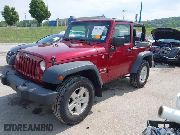 2013 Jeep Wrangler Sport z VIN 1C4GJWAG0DL543850, wystawiony jako IAAI lot #42374916 z przebiegiem 163 977 mil mil oraz . Historia ofert i sprzedaży dostępna na DreamBid. Obrazek 17.