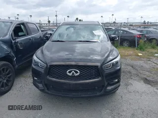 2020 Infiniti QX60 Pure with VIN 5N1DL0MN5LC525763, listed as a IAAI auction lot 41259100 with 38,995 mi miles and . Bid and sale history available at DreamBid. Image 12.