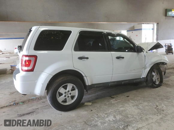 2010 Ford Escape XLS with VIN 1FMCU9C75AKD02318, listed as a Copart auction lot 59130055 with Not provided miles and Salvage title. Bid and sale history available at DreamBid. Image 3.