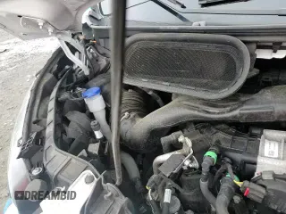2023 Ford Transit Cargo z VIN 1FTYE1C87PKA69777, wystawiony jako Copart lot #57027155 z przebiegiem 40 049 mil mil oraz Szkoda całkowita • Salvage title. Historia ofert i sprzedaży dostępna na DreamBid. Obrazek 14.