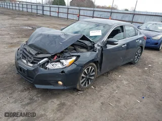 2018 Nissan Altima 2.5 SR with VIN 1N4AL3AP4JC210566, listed as a IAAI auction lot 41167719 with 157,423 mi miles. Bid and sale history available at carsss.com. Image 17.