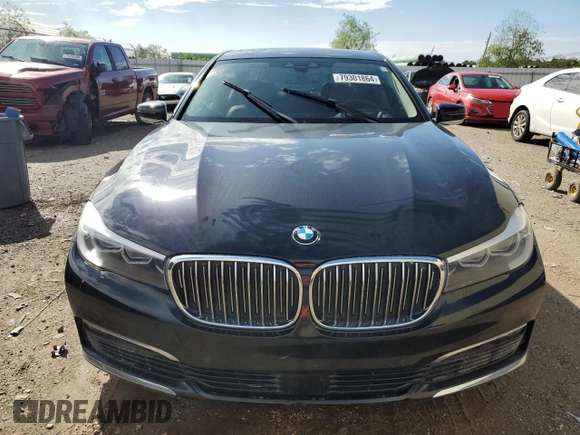 2018 BMW 7 Series 740i with VIN WBA7E2C57JG742193, listed as a Copart auction lot 79301864 with 87,706 mi miles and Salvage Title. Bid and sale history available at carsss.com. Image 5.