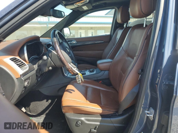 2020 Jeep Grand Cherokee Summit with VIN 1C4RJFJG8LC315893, listed as a Copart auction lot 48371595 with 64,383 mi miles and Salvage title. Bid and sale history available at DreamBid. Image 7.
