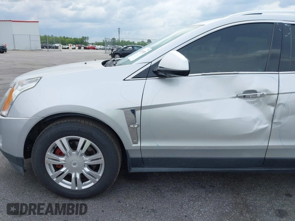 2011 Cadillac SRX Luxury Collection with VIN 3GYFNAEY5BS563048, listed as a IAAI auction lot 42031973 with 182,047 mi miles and . Bid and sale history available at DreamBid. Image 14.