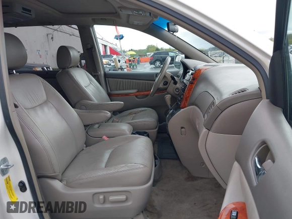 2007 Toyota Sienna XLE with VIN 5TDZK22C67S073269, listed as a IAAI auction lot 41979071 with 311,994 mi miles and . Bid and sale history available at DreamBid. Image 5.