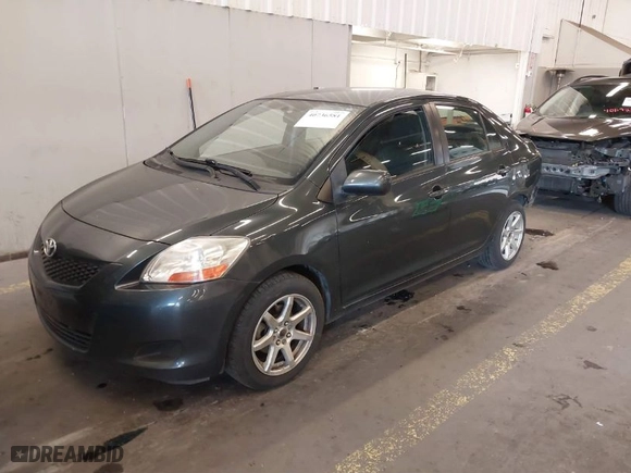 2010 Toyota Yaris with VIN JTDBT4K33A1354492, listed as a IAAI auction lot 40736581 with 228,018 mi miles. Bid and sale history available at carsss.com. Image 2.