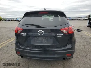 2015 Mazda CX-5 Touring with VIN JM3KE4CY3F0475757, listed as a Copart auction lot 53477875 with 104,546 mi miles and Salvage Title. Bid and sale history available at carsss.com. Image 6.