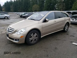 2006 Mercedes-Benz R 5.0L with VIN 4JGCB75E56A013748, listed as a Copart auction lot 82248334 with 68,954 mi miles and Salvage Title. Bid and sale history available at DreamBid. Image 1.