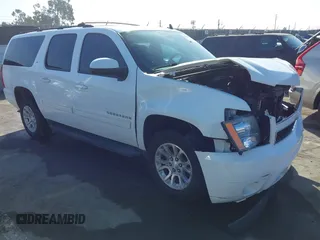 2014 Chevrolet Suburban LT with VIN 1GNSKJE71ER122990, listed as a IAAI auction lot 41674176 with 163,382 mi miles and . Bid and sale history available at DreamBid. Image 1.
