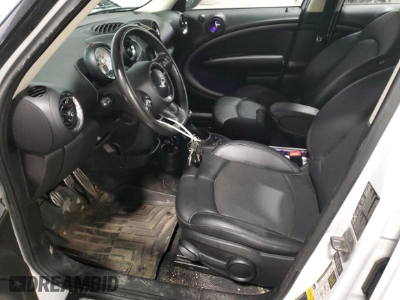2013 MINI Countryman S ALL4 with VIN WMWZC5C56DWM15763, listed as a Copart auction lot 51165565 with 165,494 mi miles and Salvage Title. Bid and sale history available at DreamBid. Image 7.