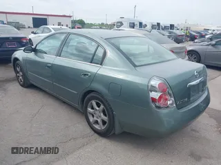 2005 Nissan Altima 2.5 S with VIN 1N4AL11D05N404581, listed as a IAAI auction lot 42073642 with 92,918 mi miles. Bid and sale history available at carsss.com. Image 3.