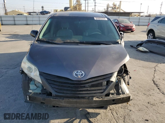 2012 Toyota Sienna with VIN 5TDKA3DC6CS010187, listed as a Copart auction lot 86885234 with 145,745 mi miles and Salvage Title. Bid and sale history available at DreamBid. Image 5.