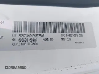 2014 Dodge Charger SXT with VIN 2C3CDXHG4EH337807, listed as a IAAI auction lot 42027319 with 151,988 mi miles. Bid and sale history available at carsss.com. Image 9.
