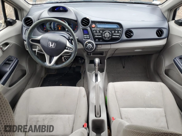 2010 Honda Insight LX with VIN JHMZE2H56AS022299, listed as a Copart auction lot 54872215 with 149,514 mi miles and Salvage title. Bid and sale history available at DreamBid. Image 8.