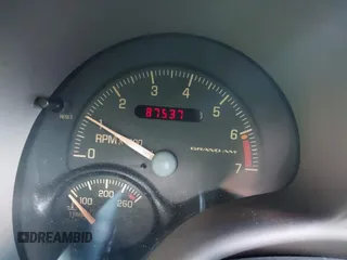 1999 Pontiac Grand Am GT with VIN 1G2NW12E3XM830305, listed as a IAAI auction lot 41797278 with 87,537 mi miles. Bid and sale history available at carsss.com. Image 7.