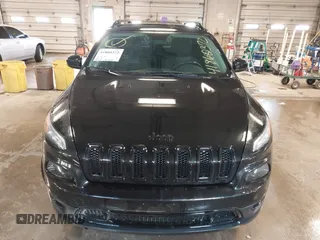 2014 Jeep Cherokee Latitude with VIN 1C4PJMCS0EW291135, listed as a IAAI auction lot 41860372 with 171,524 mi miles and . Bid and sale history available at DreamBid. Image 6.
