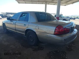 2004 Mercury Grand Marquis GS z VIN 2MEFM74W44X661154, wystawiony jako IAAI lot #42268675 z przebiegiem 236 456 mil mil oraz . Historia ofert i sprzedaży dostępna na DreamBid. Obrazek 3.