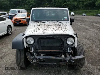 2014 Jeep Wrangler Unlimited Rubicon with VIN 1C4HJWFG4EL114743, listed as a Copart auction lot 61397575 with 110,222 mi miles and Salvage title. Bid and sale history available at DreamBid. Image 5.