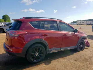 2018 Toyota RAV4 XLE with VIN 2T3RFREV7JW818661, listed as a Copart auction lot 65756615 with 56,369 mi miles and Salvage title. Bid and sale history available at DreamBid. Image 3.