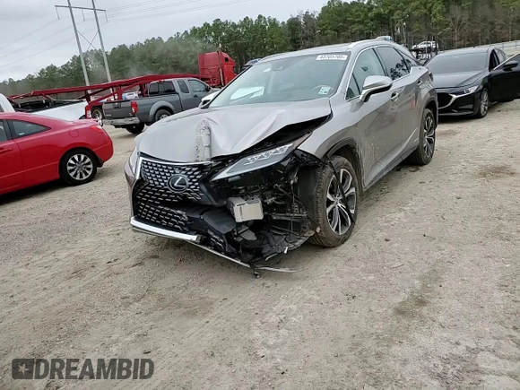 2020 Lexus RX with VIN 2T2HGMDA6LC043854, listed as a Copart auction lot 43705705 with 39,700 mi miles and Salvage Title. Bid and sale history available at carsss.com. Image 11.