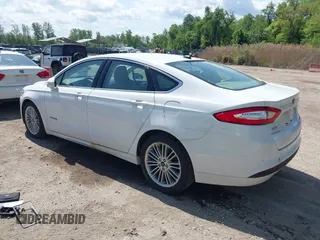 2013 Ford Fusion SE Hybrid with VIN 3FA6P0LU4DR337674, listed as a IAAI auction lot 42164262 with 150,902 mi miles and . Bid and sale history available at carsss.com. Image 3.
