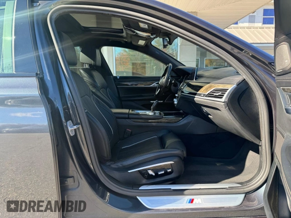 2016 BMW 7 Series 750i with VIN WBA7F0C53GGM20435, listed as a Copart auction lot 84705394 with 186,227 mi miles and Clean Title. Bid and sale history available at carsss.com. Image 5.